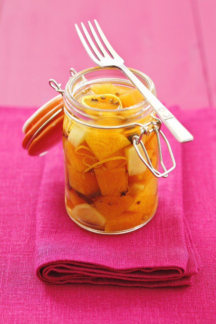 Sweet and sour pickled pumpkin with ginger and lemon