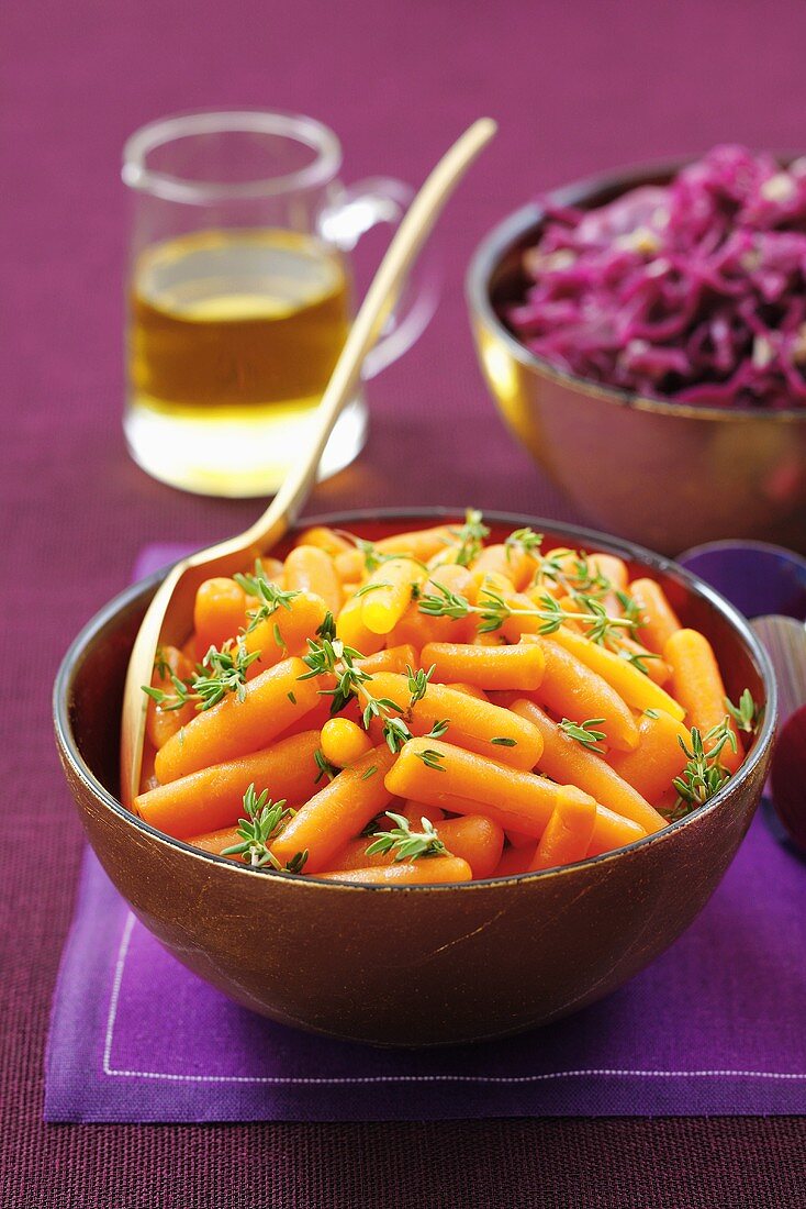 Buttered carrots with thyme, and a red cabbage salad in the background