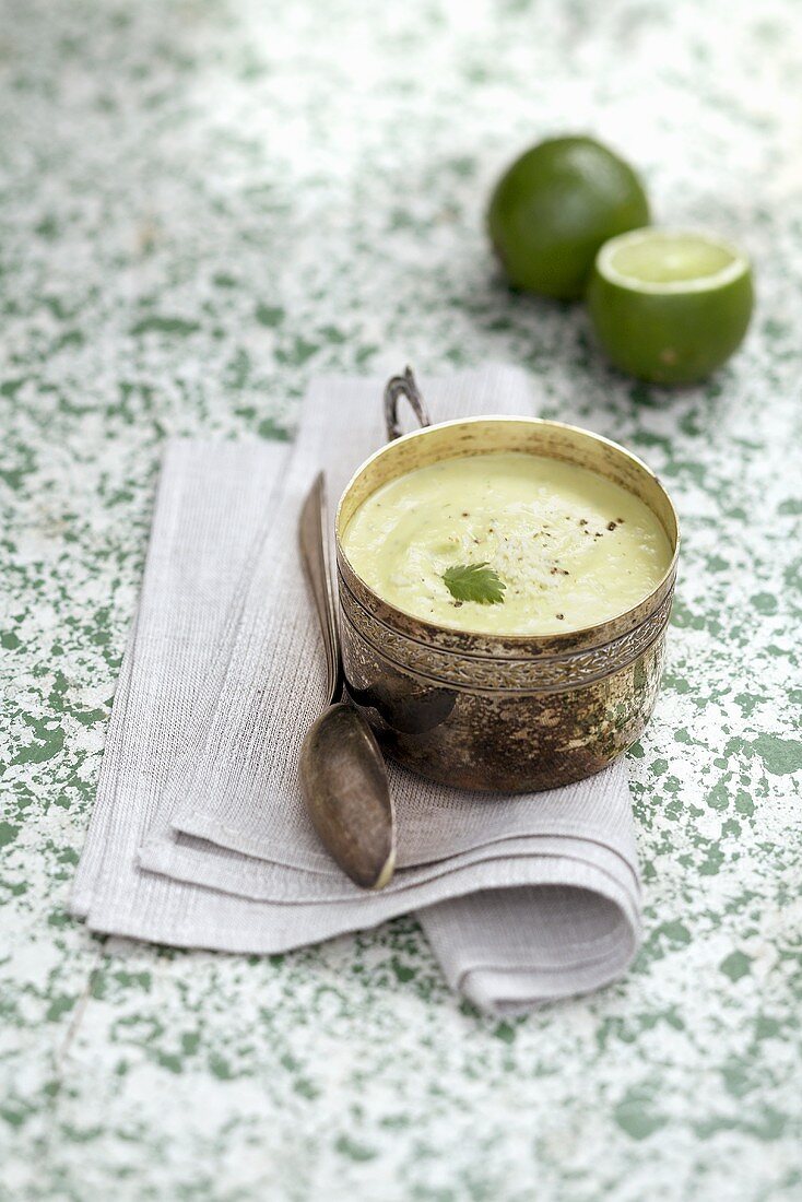 Avocado and coconut soup with limes