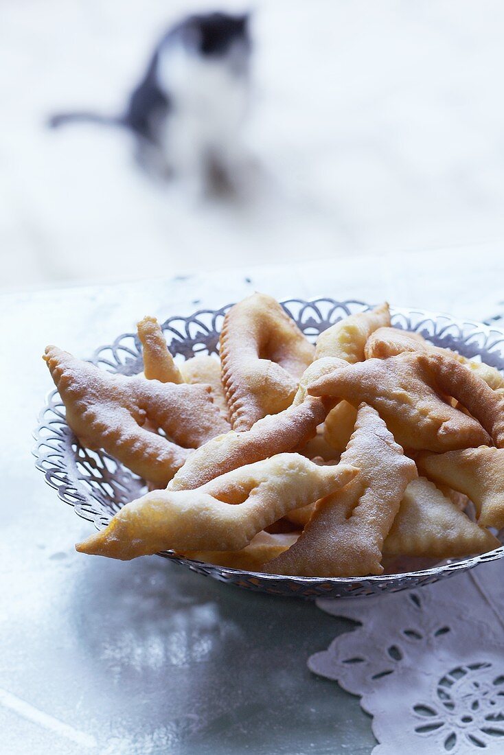 Beignets (French fried pastries) with icing sugar