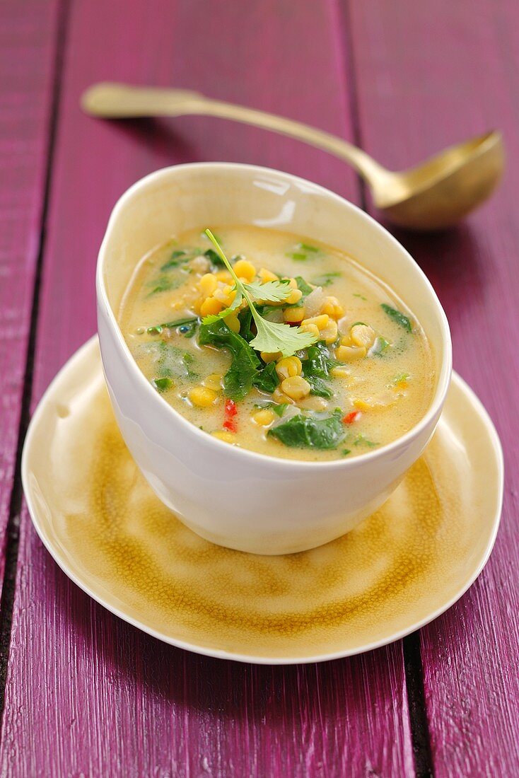 Yellow pea soup with spinach and chilli