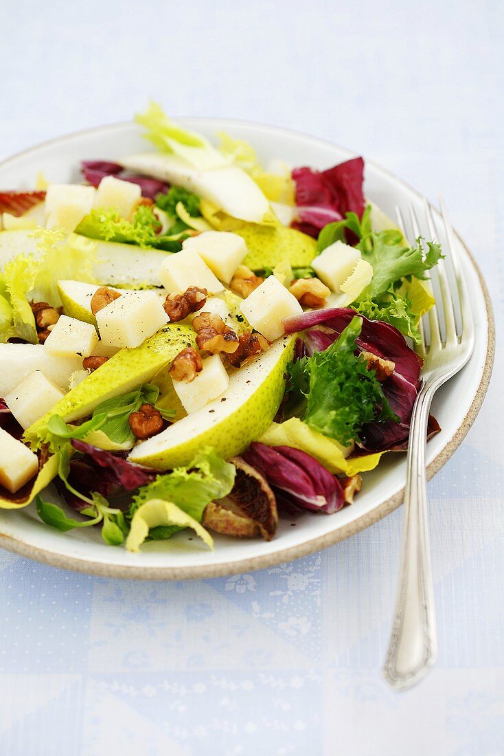 Pear and radicchio salad with pecorino and walnuts