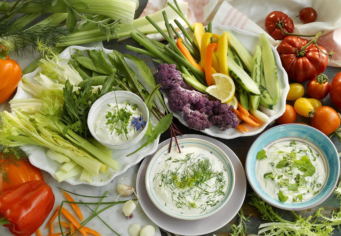 Vegetables with various herb yoghurt dips