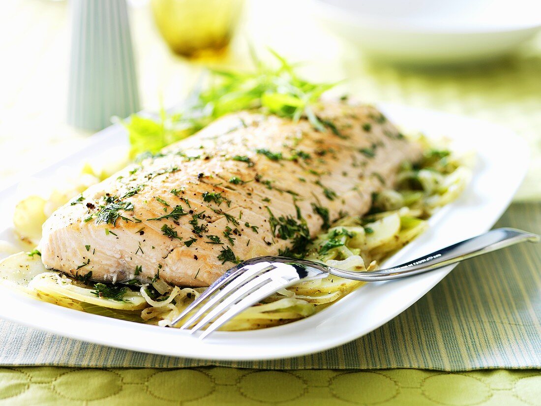 Salmon with herbs, potatoes, celeriac and onion