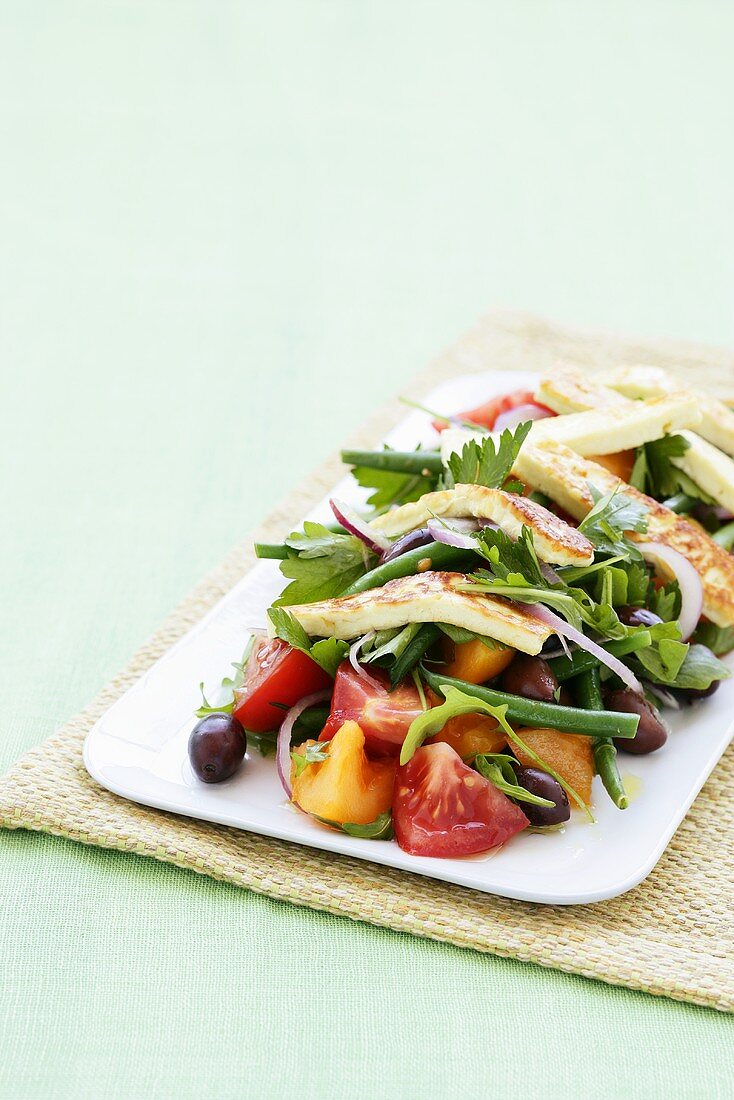 Vegetable salad with grilled haloumi