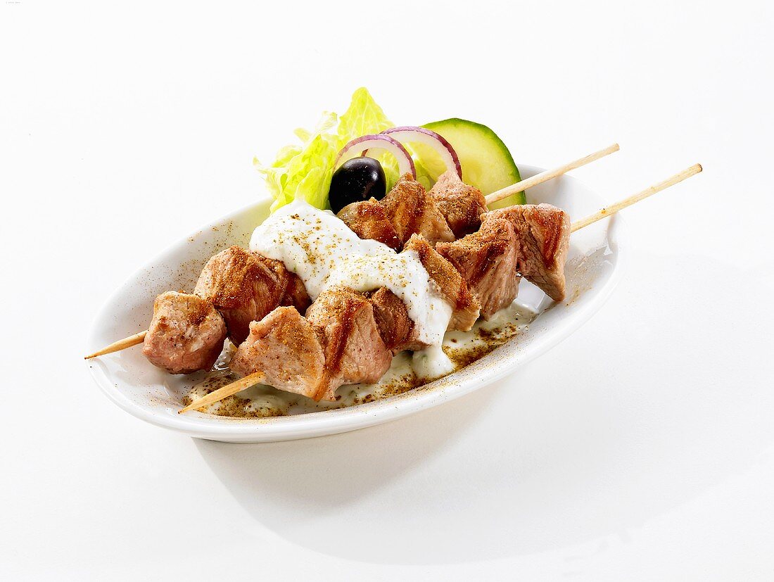 Fried pork kebabs with yoghurt sauce