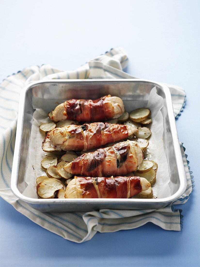 Prosciutto-wrapped chicken with potatoes