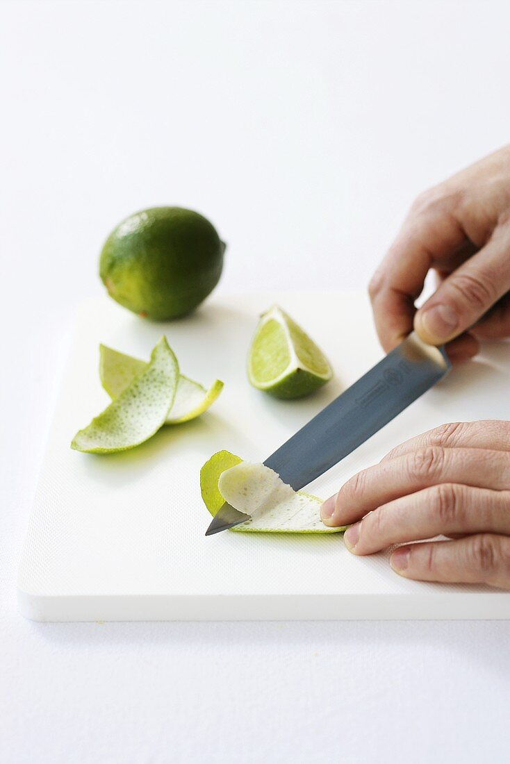 Removing the pith from lime peel (for zest)