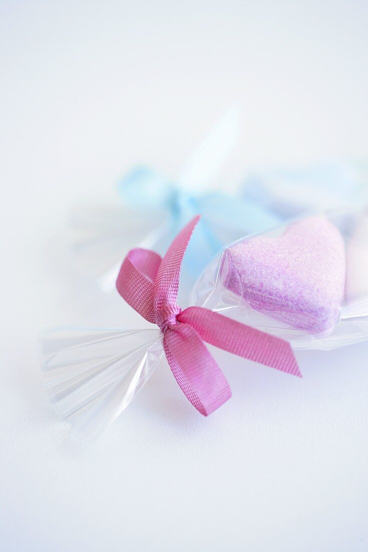 Sugar hearts in cellophane paper with bow