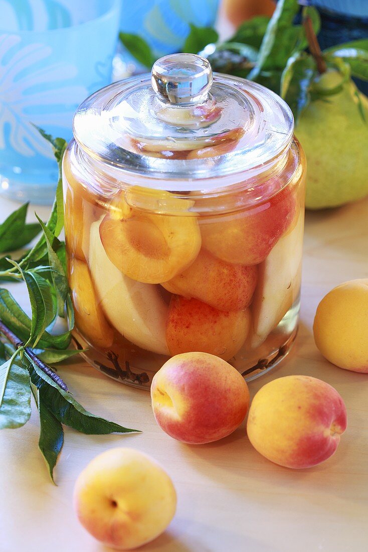 Apricot and pear compote in a glass jar