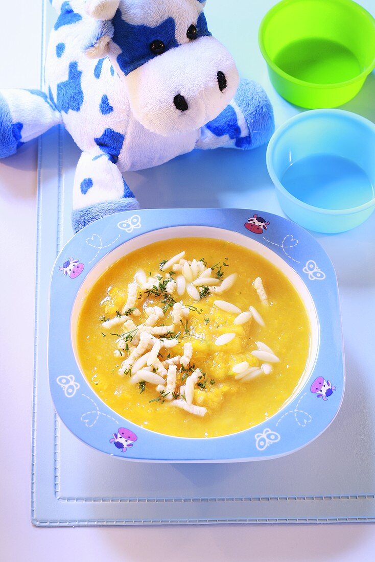 Carrot soup with noodles for children