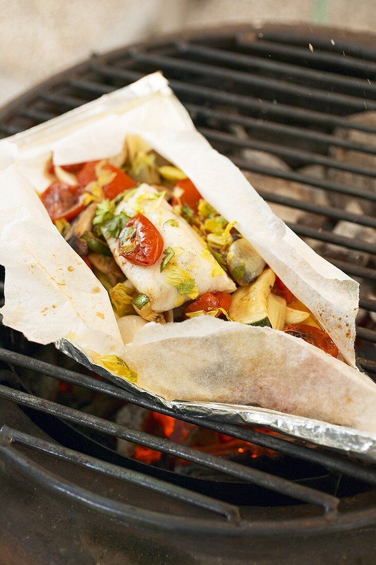 Turbot and vegetables grilled in parchment paper