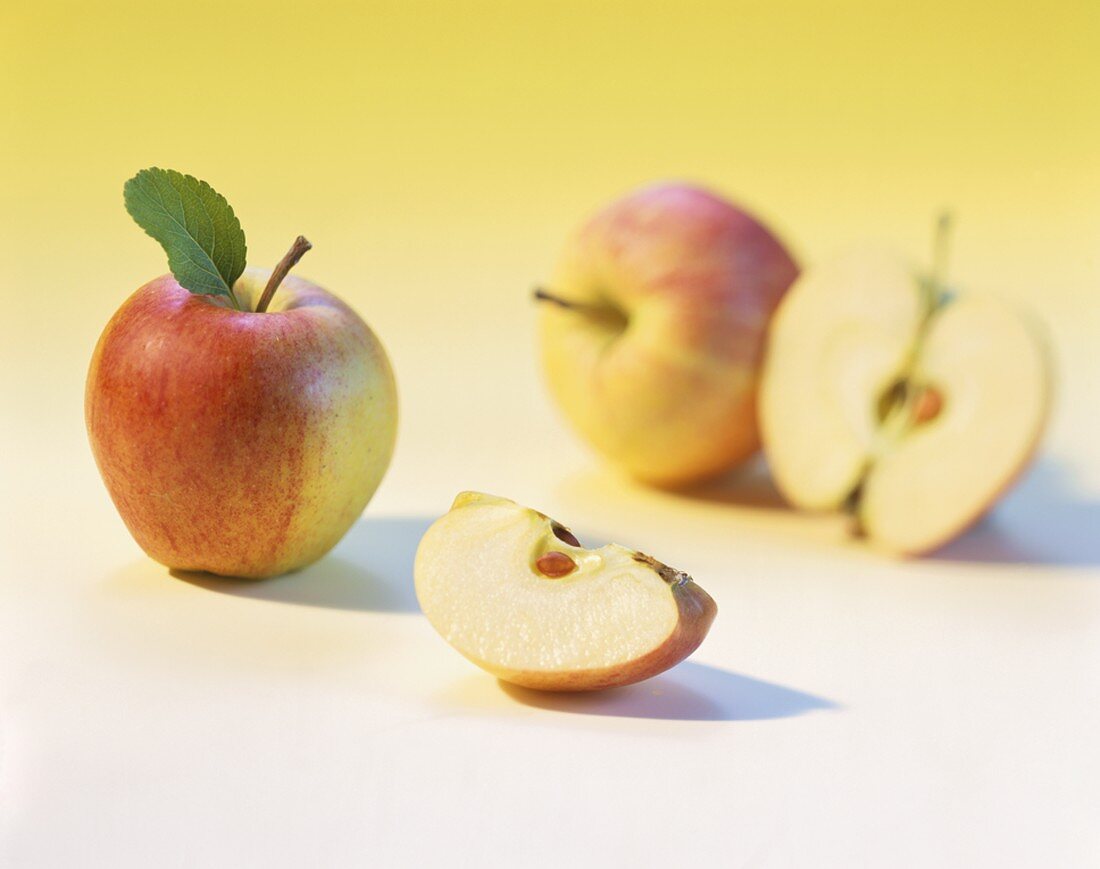 Apples, whole and cut into pieces