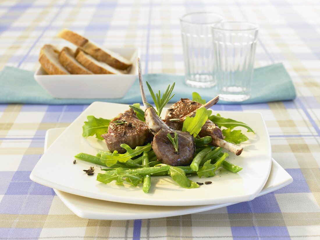 Lamb cutlets with rocket and bean salad