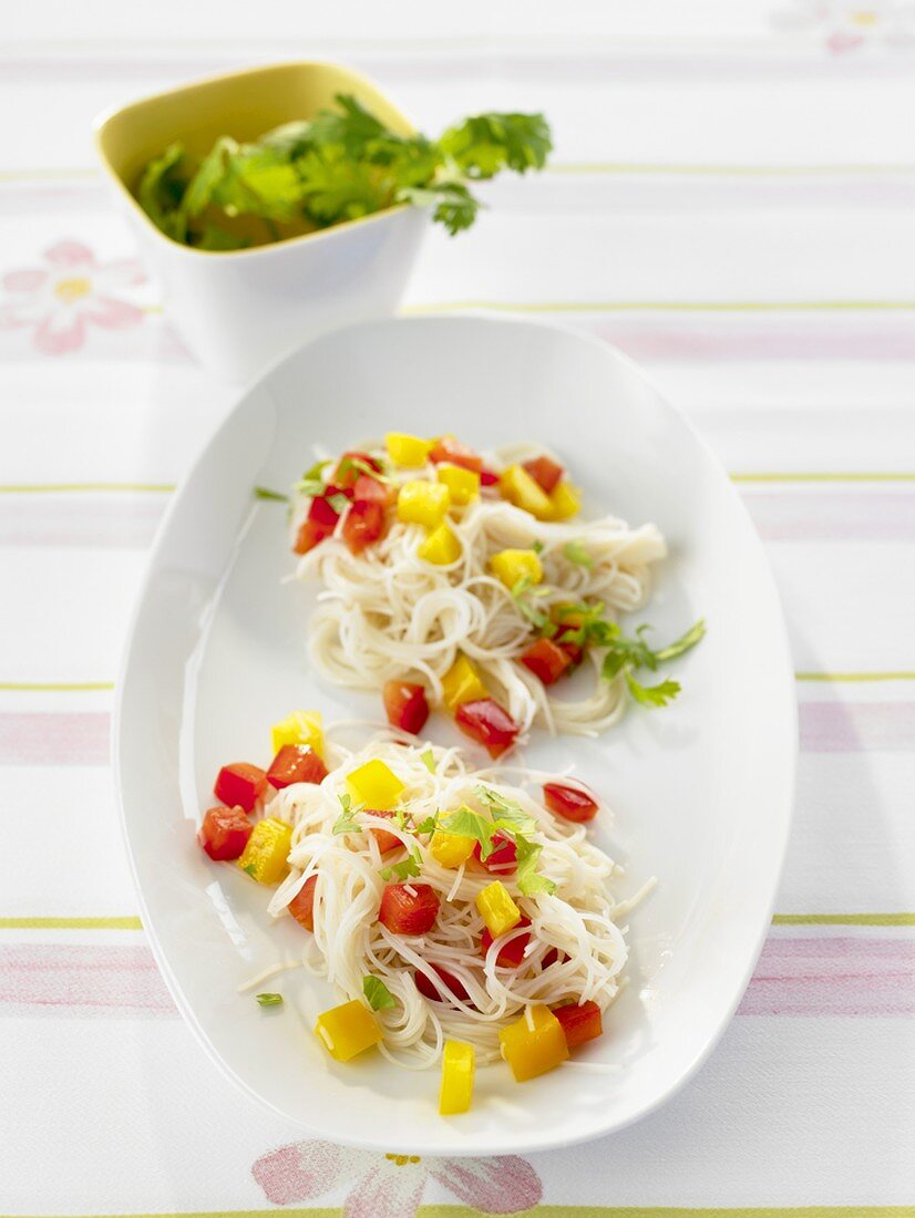 Rice vermicelli with peppers, garlic and coriander salsa