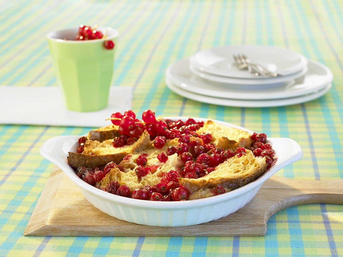Bread and butter pudding with redcurrants