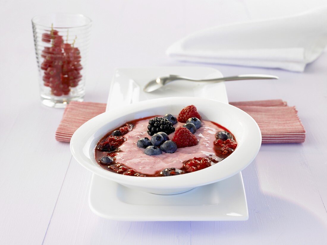 Cold mixed berry soup with rolled oats and buttermilk