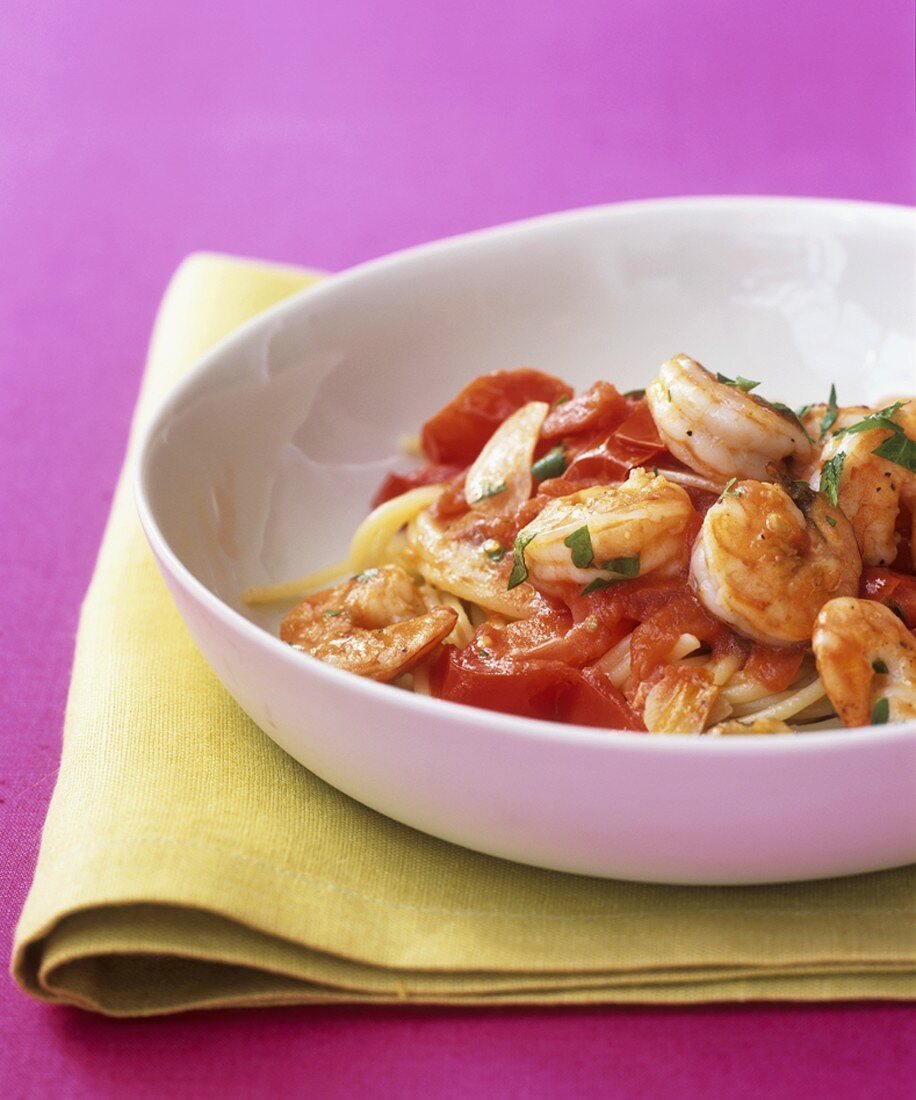 Prawns and tomatoes on linguine