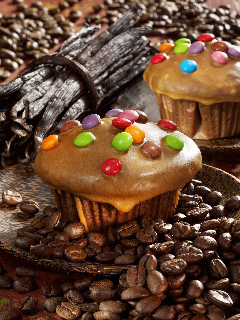 Coffee & vanilla muffins decorated with coloured chocolate beans