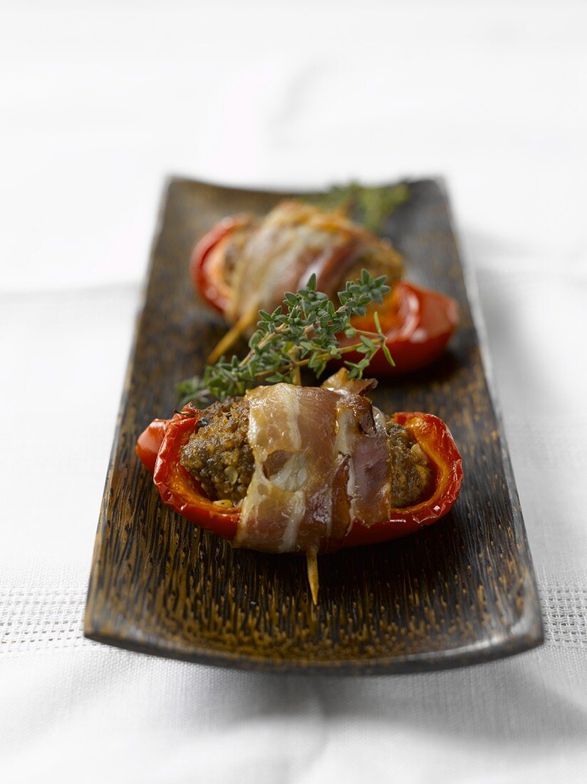 Bacon-wrapped stuffed peppers