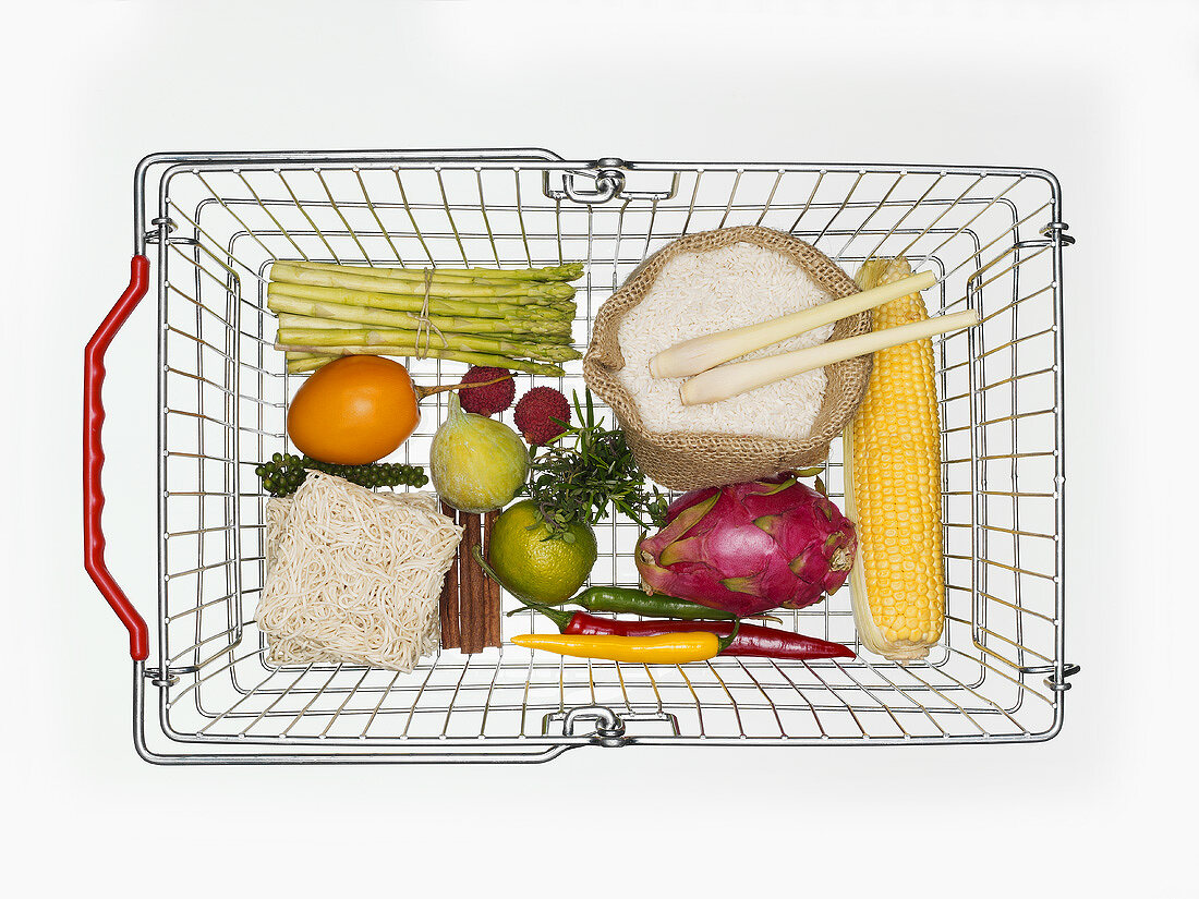 Various foods in shopping basket (from above)