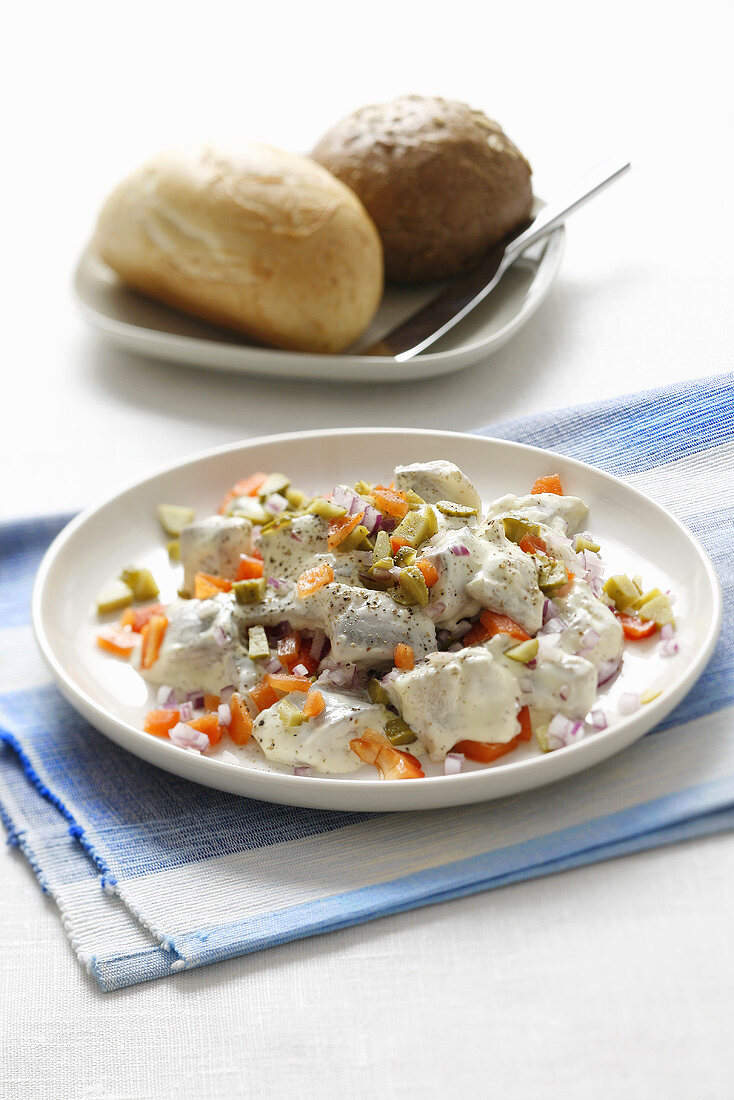 Herring salad with diced peppers and mayonnaise