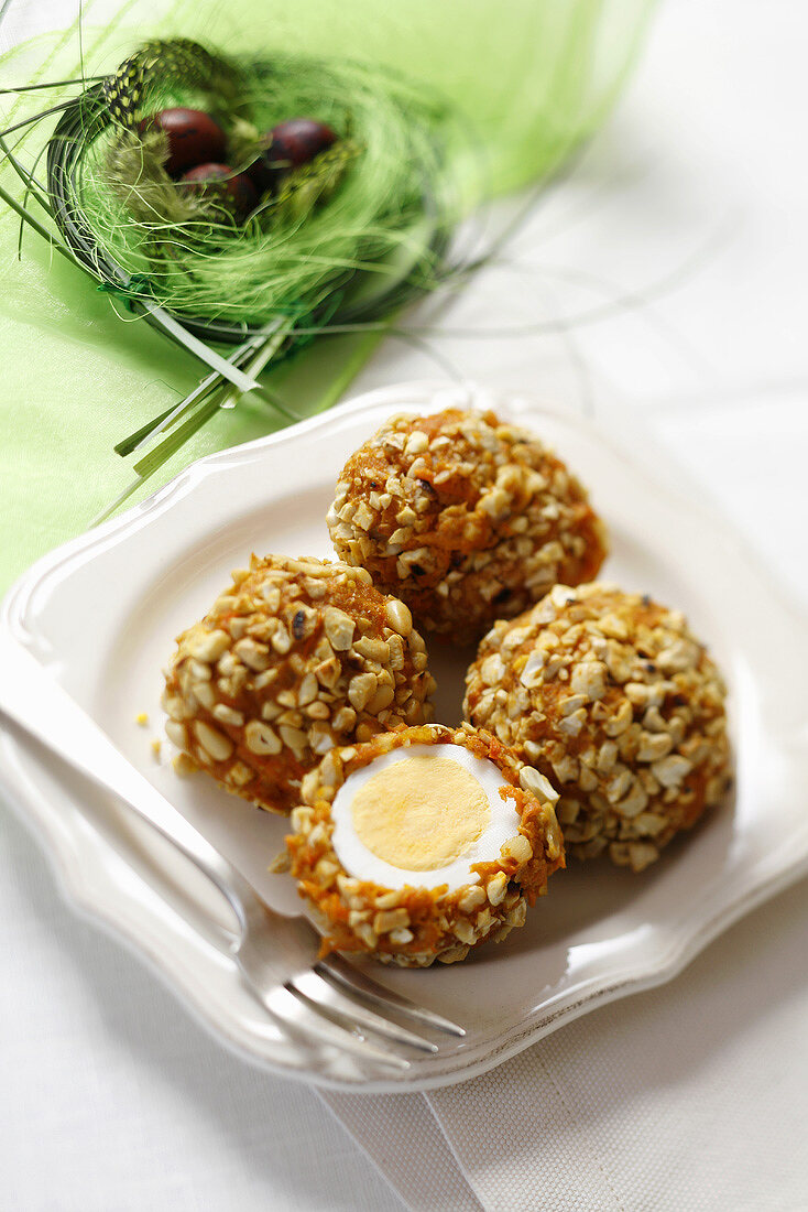 Boiled eggs with nut coating