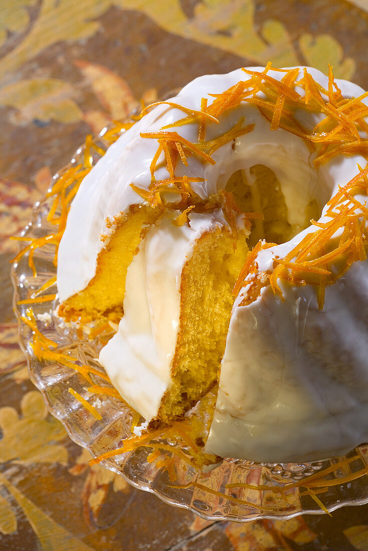 Iced wreath cake with orange zest for Easter (Poland)