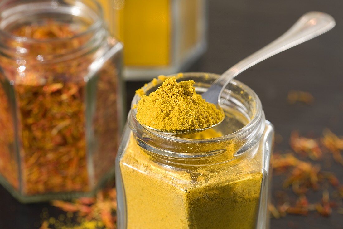 Curry powder and saffron in jars