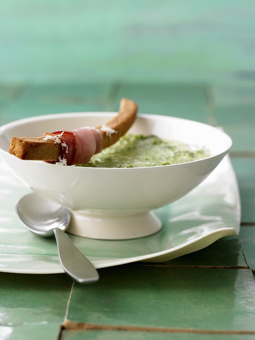 Watercress soup with crispy ham roll