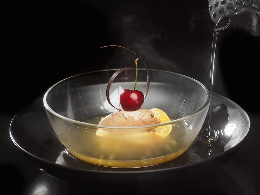 Chocolate ice cream with deep-fried pastry leaf on tea jelly