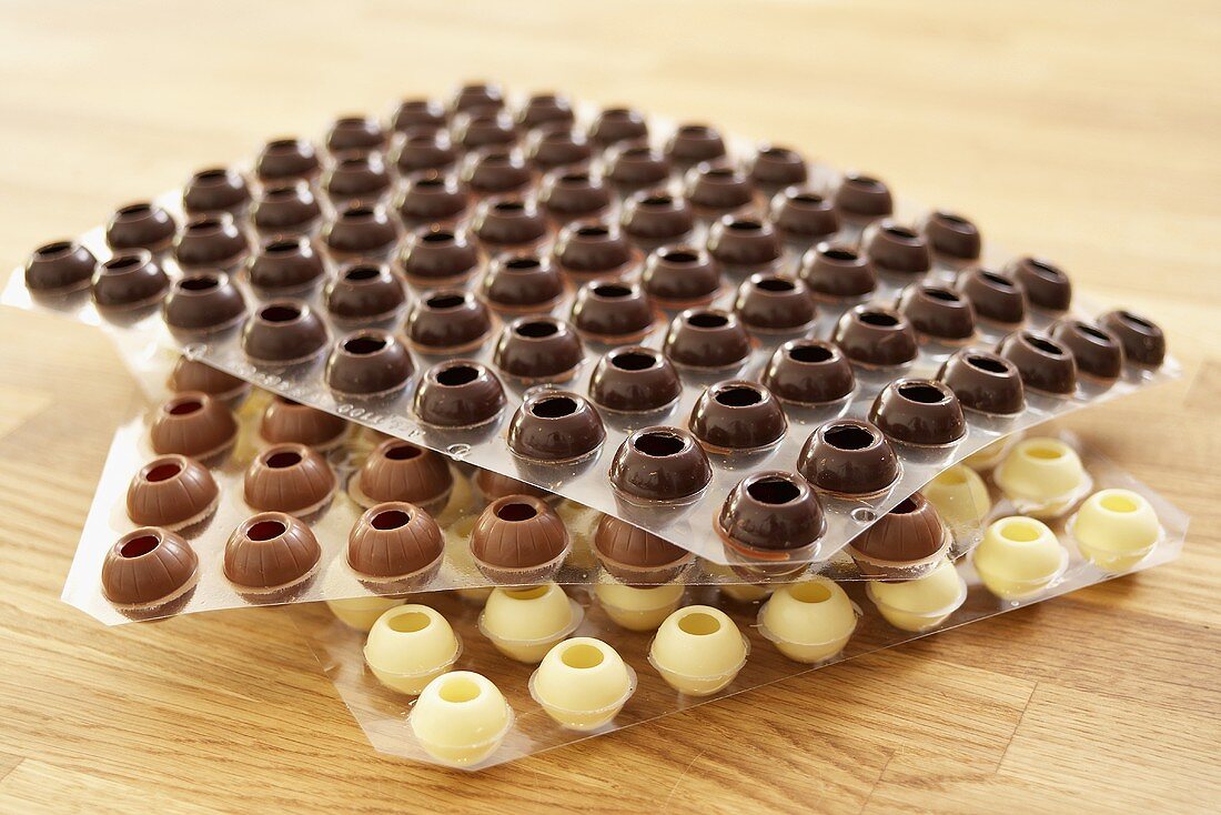 Chocolate truffle shells (white, milk and dark)