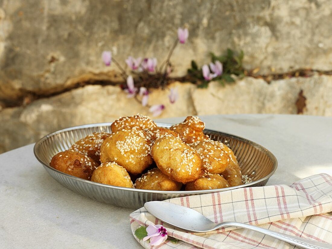 Loukoumades (Greek honey balls with sesame seeds)