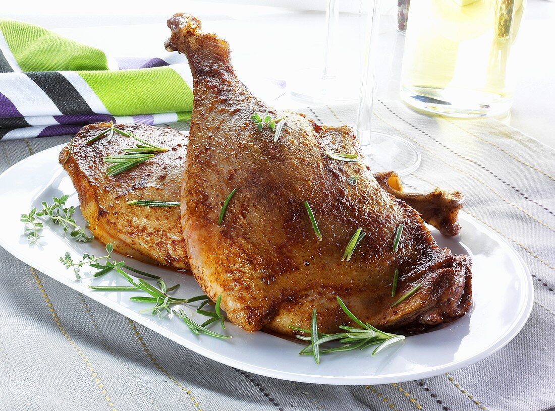 Roast goose legs with herbs