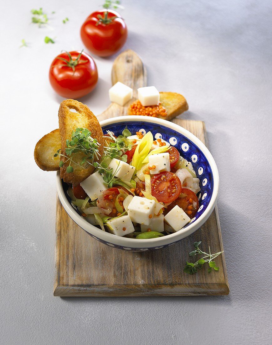 Vegetable salad with lentils, goat's cheese and cress