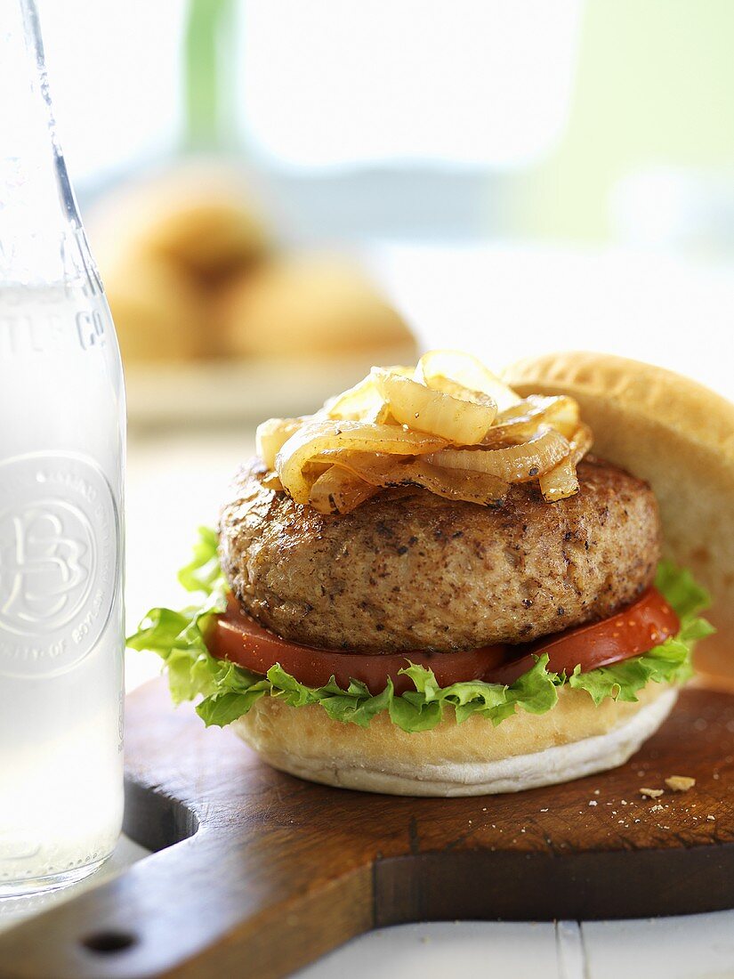 Chicken burger with caramelised onions