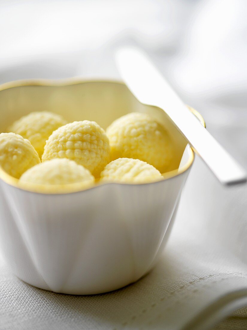 Butter balls in a dish