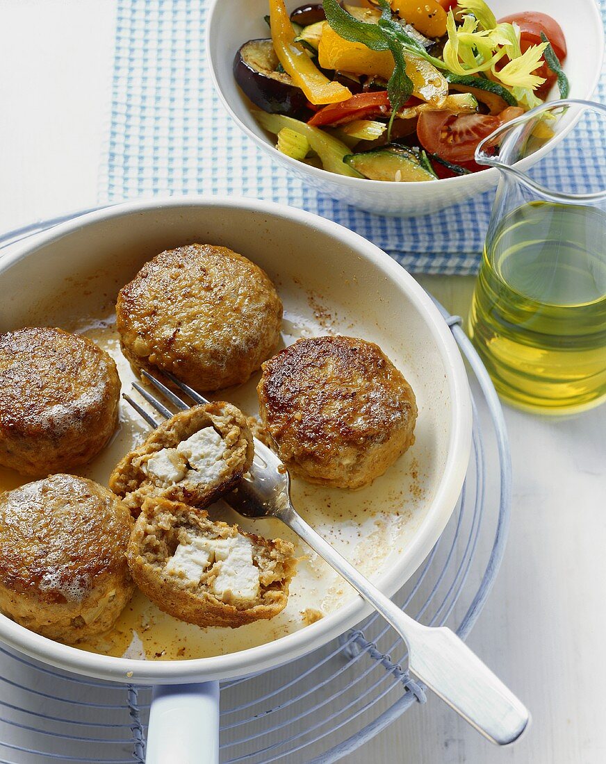 Feta burgers with lukewarm roasted vegetable salad