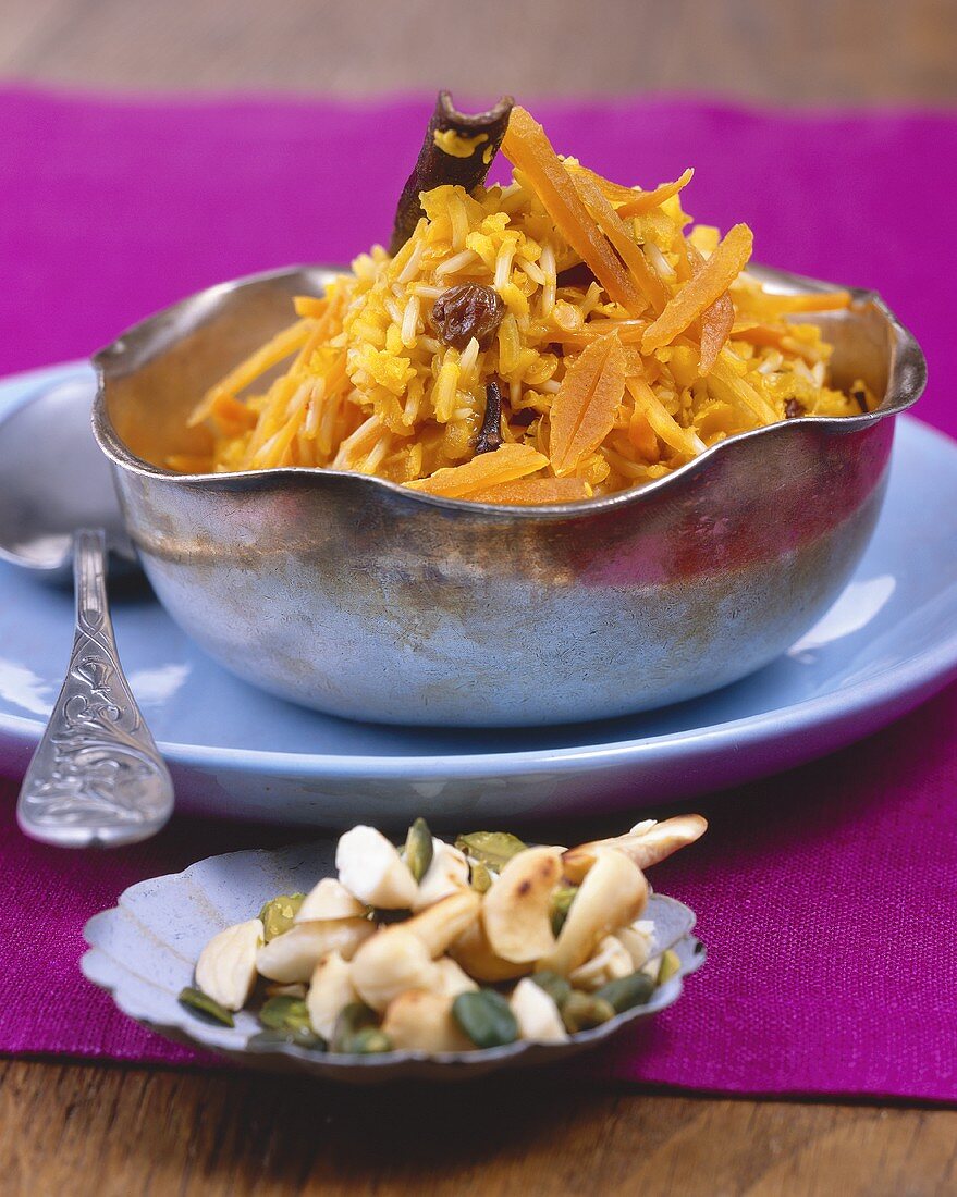 Spicy pilau with carrots, apricots and raisins