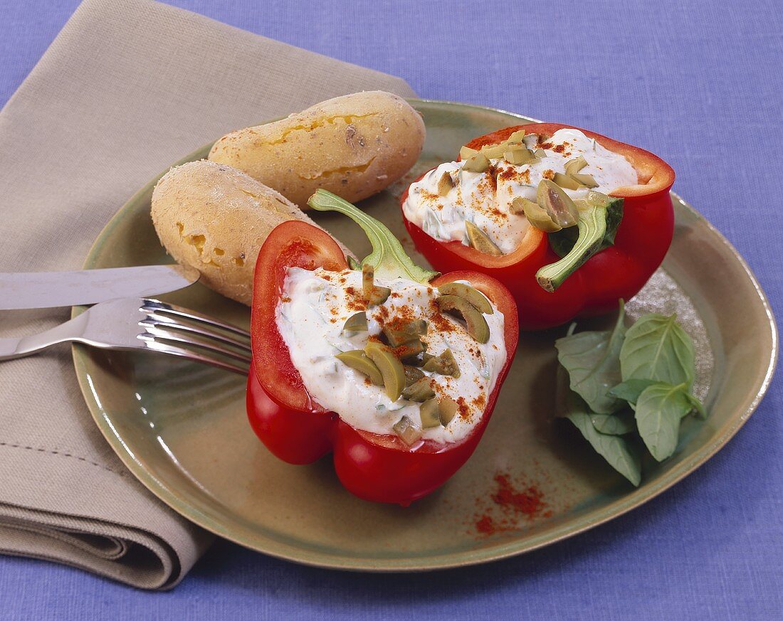 Peppers with quark & olive stuffing & potatoes in their skins