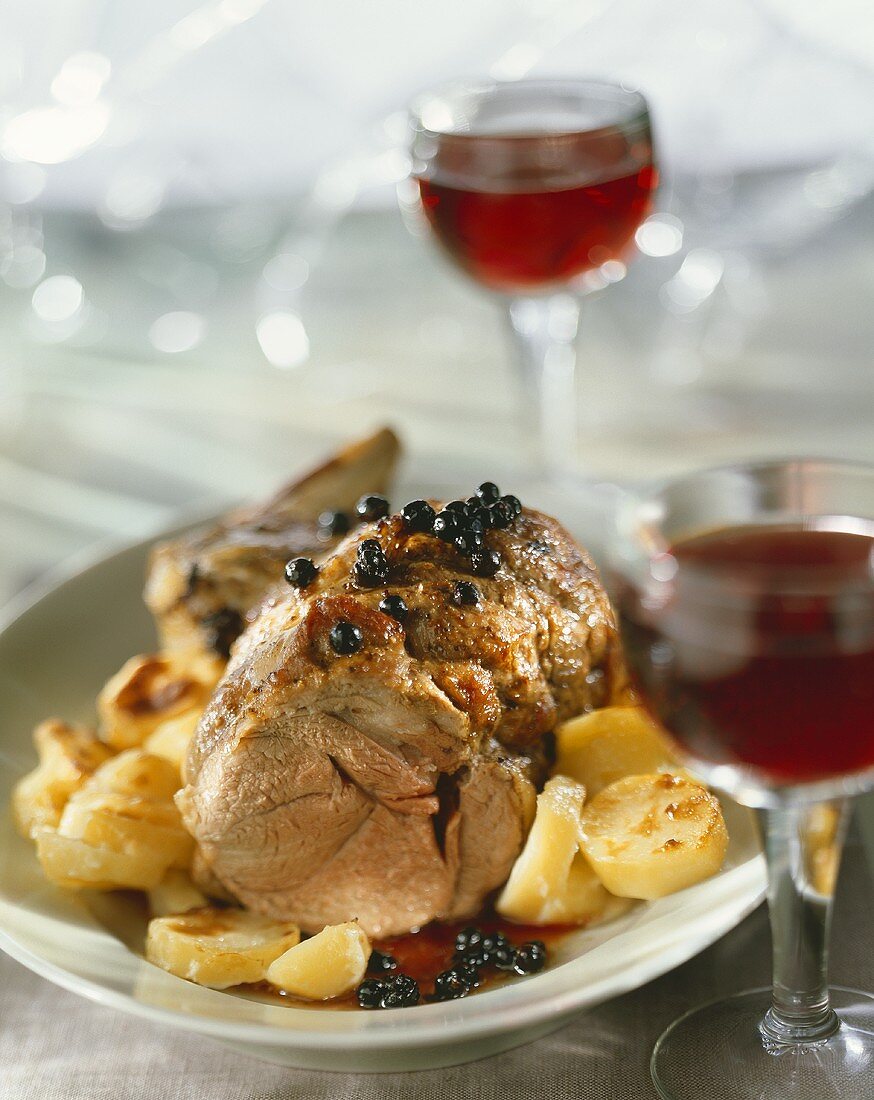 Roast veal with redcurrant sauce and potatoes