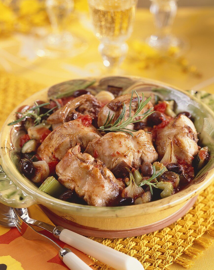 Braised rabbit with olives and rosemary