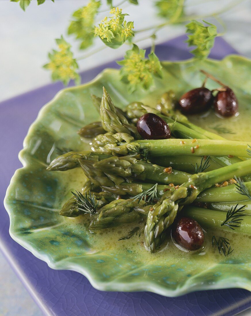 Green asparagus with black olives