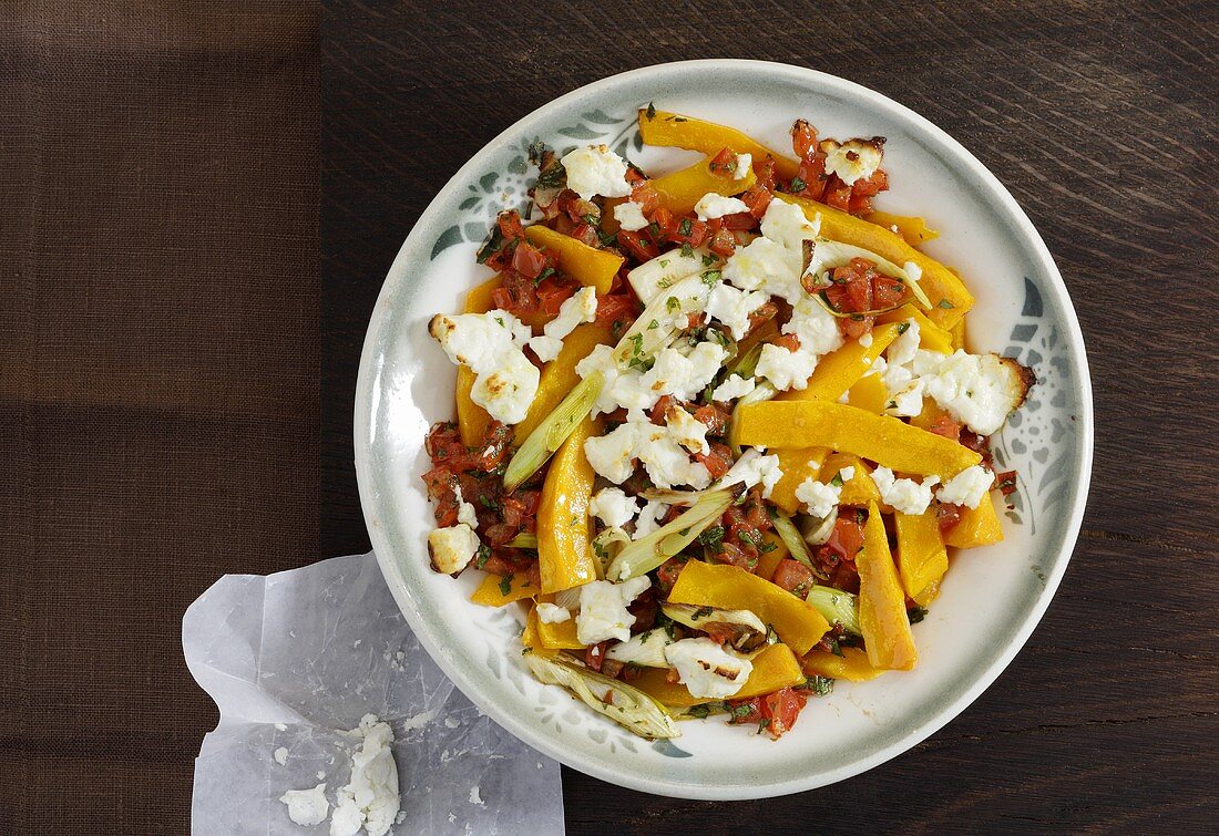 Pumpkin gratin with tomatoes and feta cheese