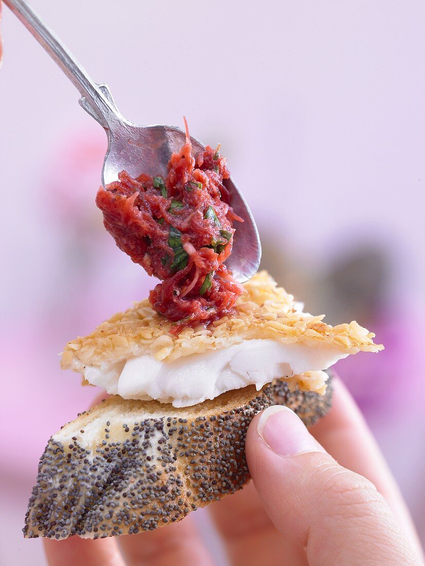 Plaice fillet & beetroot relish on slice of poppy seed plait