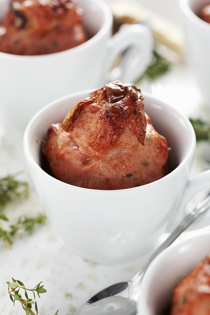 Leberkäse with truffle (a type of meatloaf) in cappuccino cup