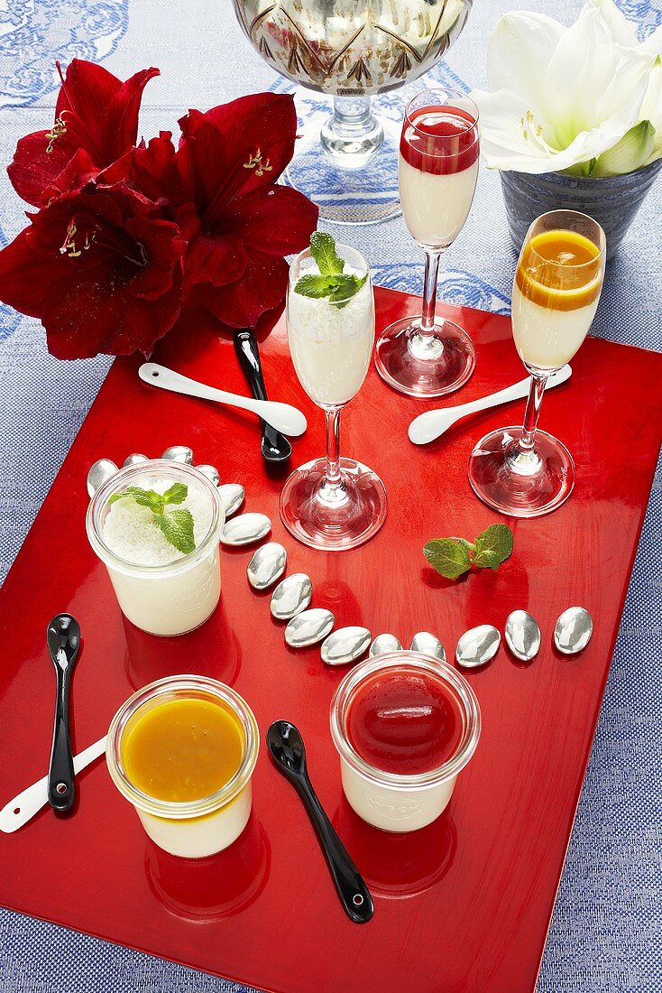 Exotic versions of panna cotta served in glasses