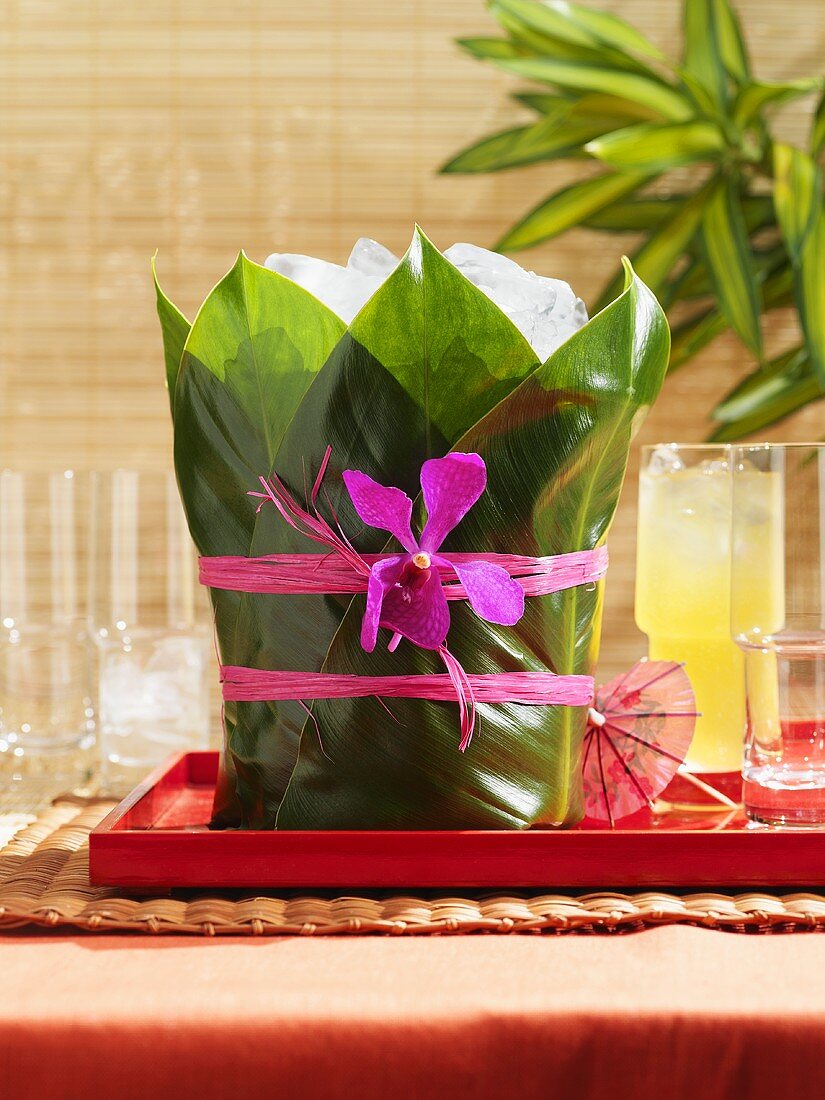 Ice cube container wrapped in banana leaf