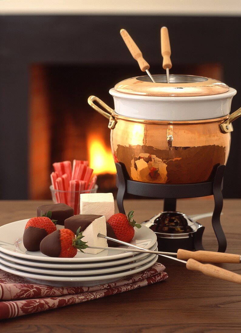 Chocolate fondue with strawberries, marshmallows & candy bars