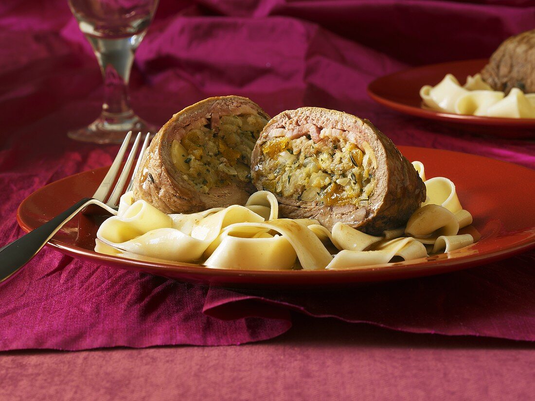 Beef with macadamia and olive stuffing and ribbon pasta